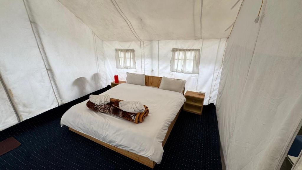 Postel nebo postele na pokoji v ubytování De Reeva Camp