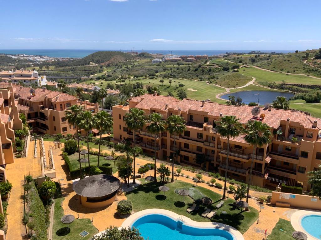 an aerial view of an apartment complex with a resort at M&M La Cala Suite in La Cala de Mijas