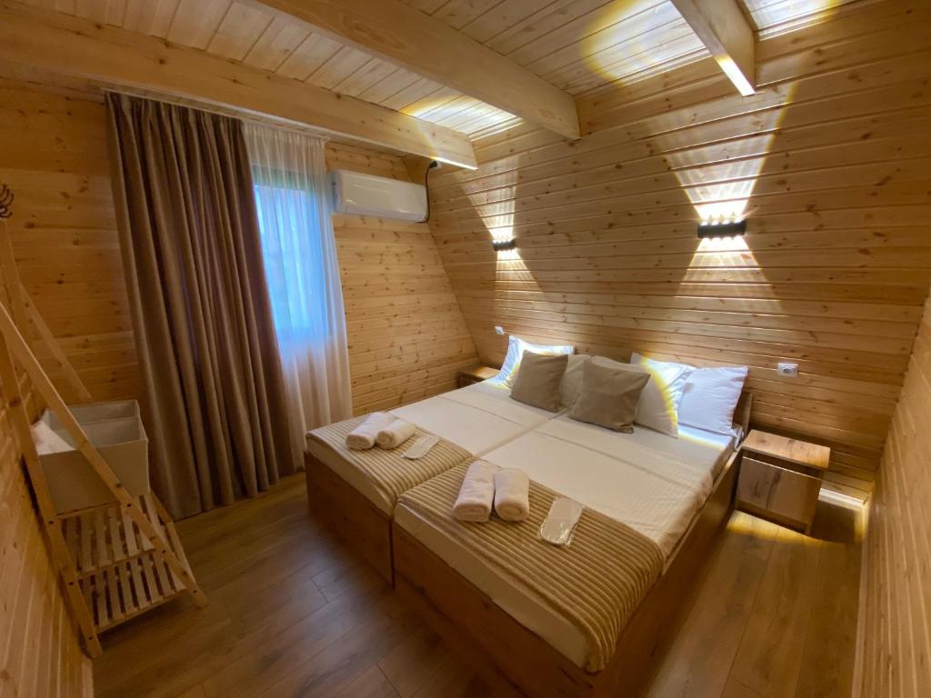 Postel nebo postele na pokoji v ubytování Chalet Martvili