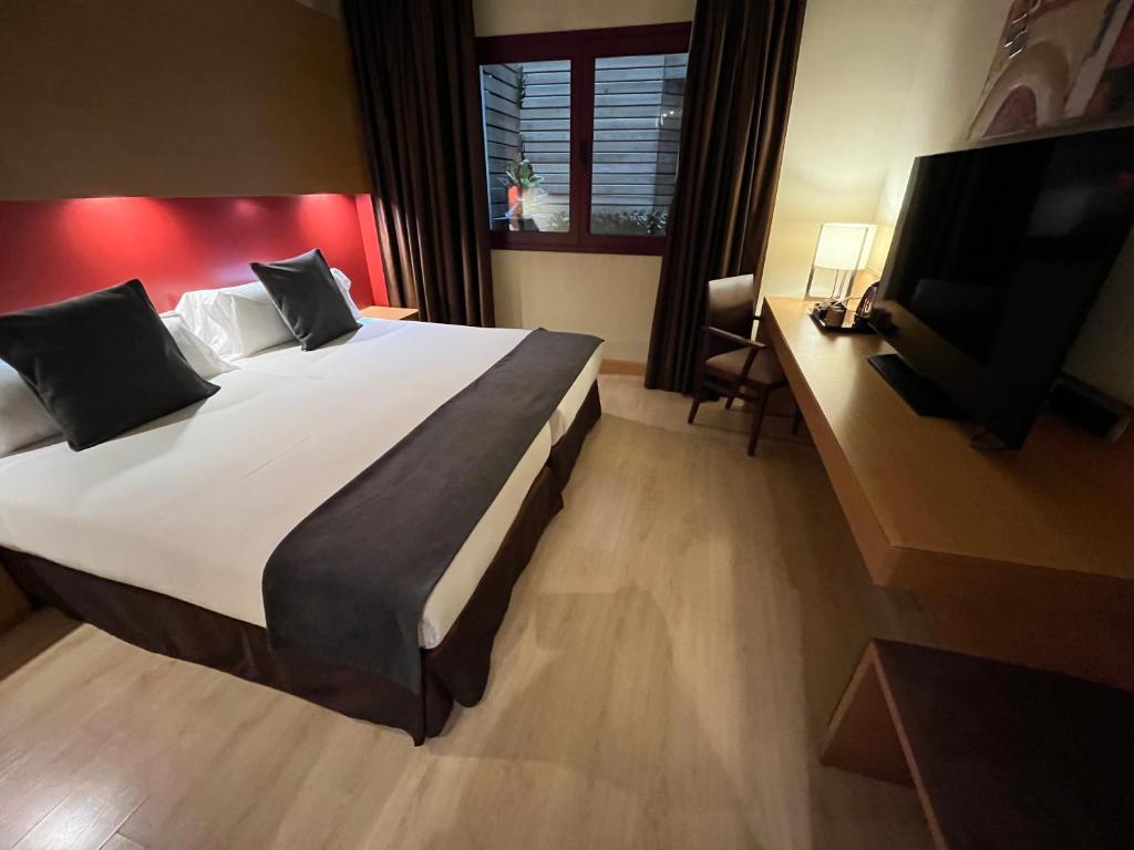 Postel nebo postele na pokoji v ubytování Wuau! Hotel Galanthus & Spa