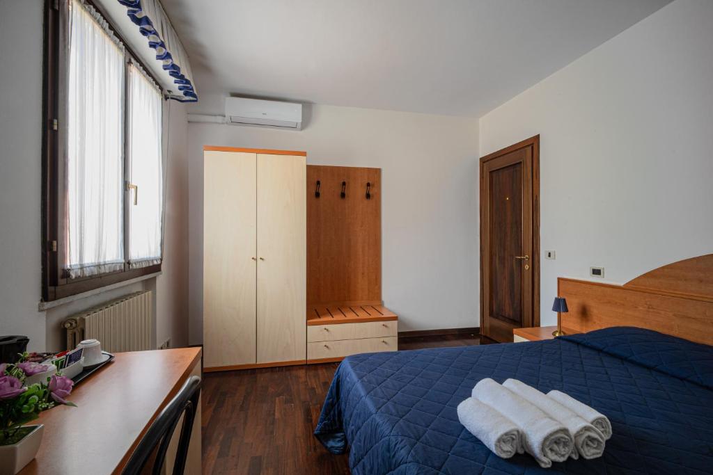 Letto o letti in una camera di Giada Sirio & Giada Orione