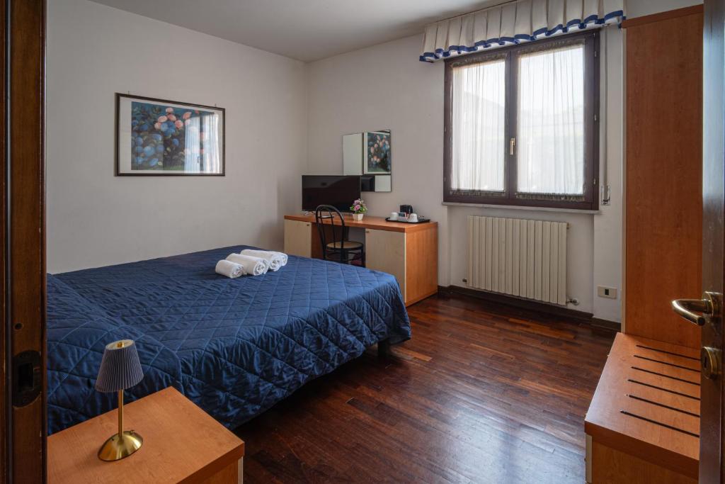 Letto o letti in una camera di Giada Sirio & Giada Orione