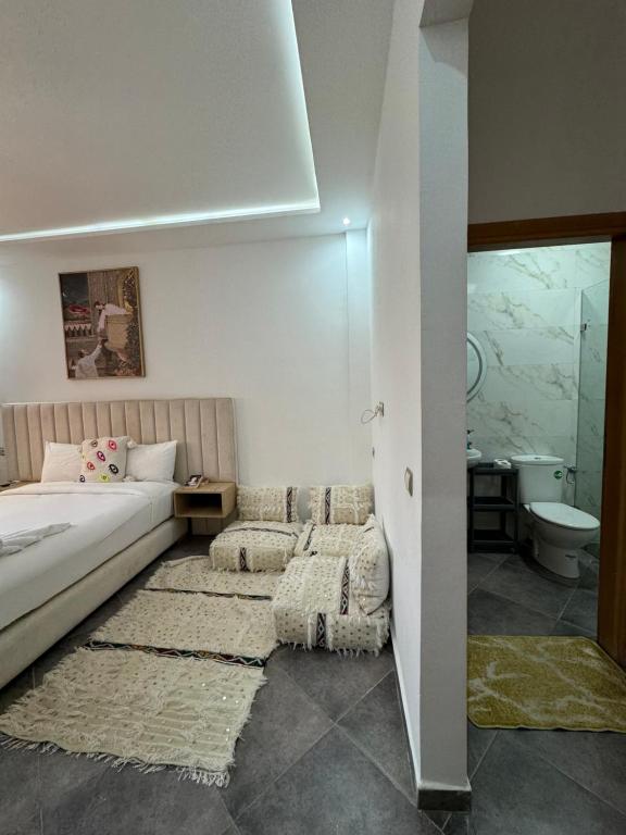 Postel nebo postele na pokoji v ubytování Playa Surf House