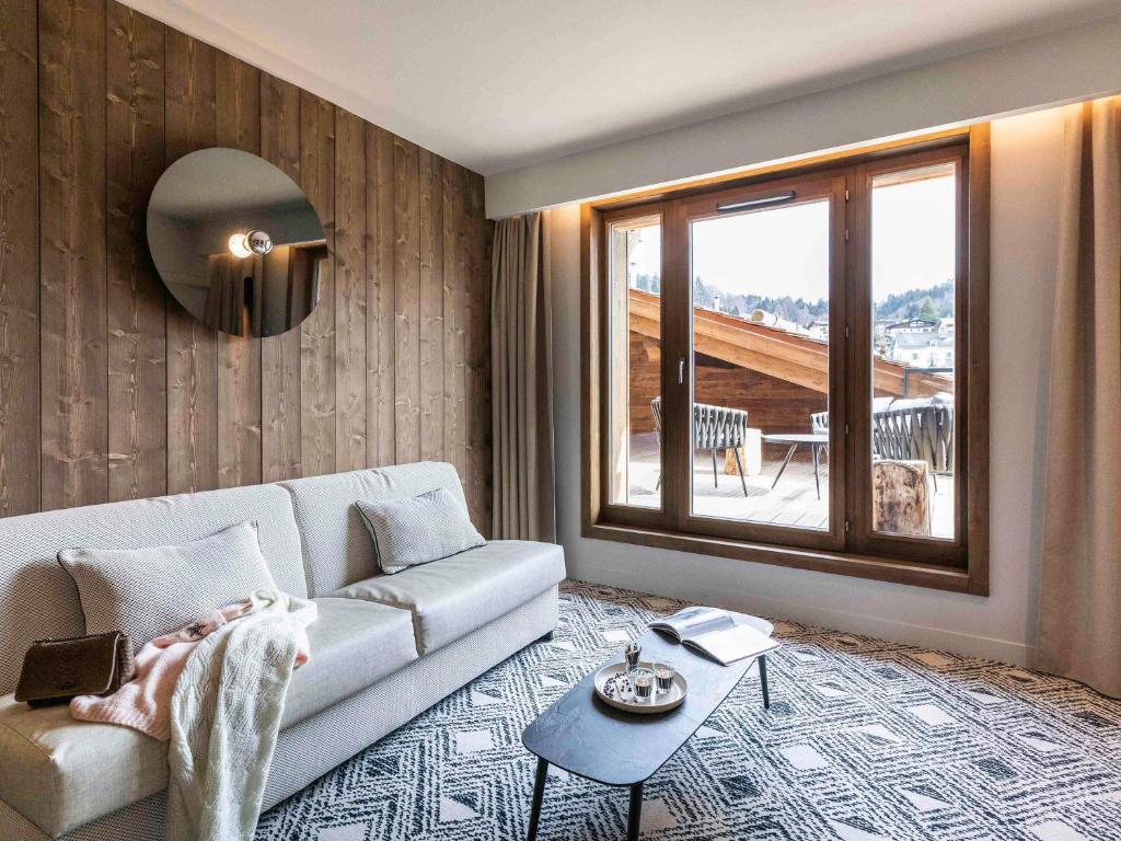 Гостиная зона в Novotel Megève Mont-Blanc
