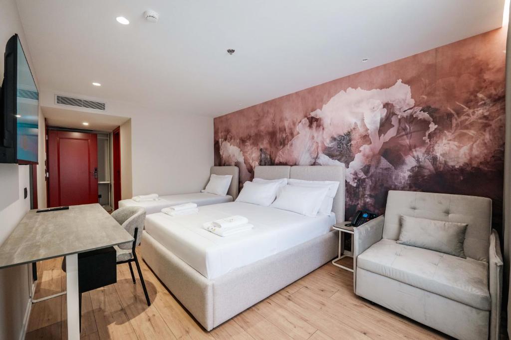 Ermes Luxury Hotel - Camera Deluxe Tripla Con Divano