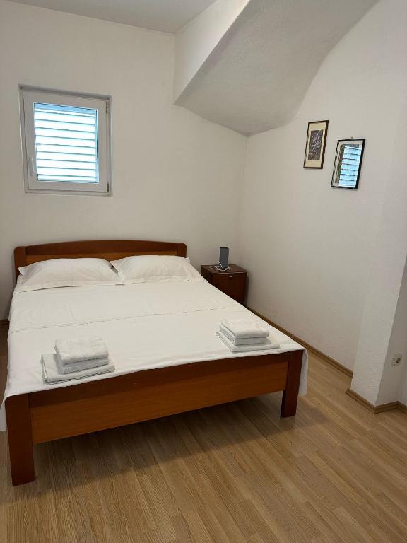 Posteľ alebo postele v izbe v ubytovaní Apartman Adriatic Pavlinovic - Makarska
