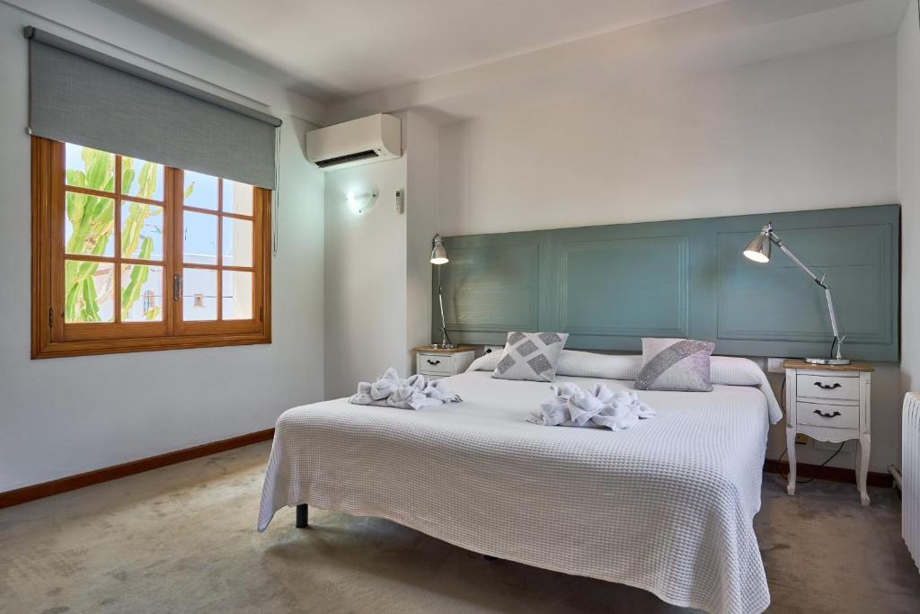 Postel nebo postele na pokoji v ubytování Villa Retorn