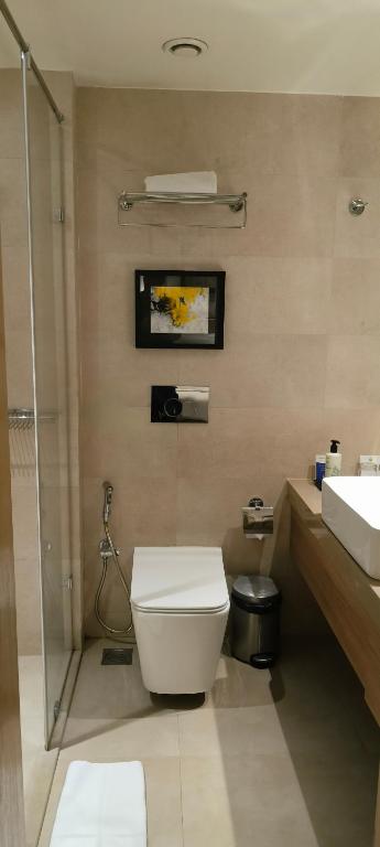 Koupelna v ubytování Royal Hometel Suites