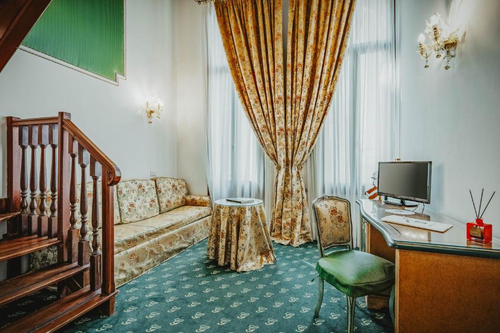 TV a/nebo společenská místnost v ubytování Hotel Giorgione