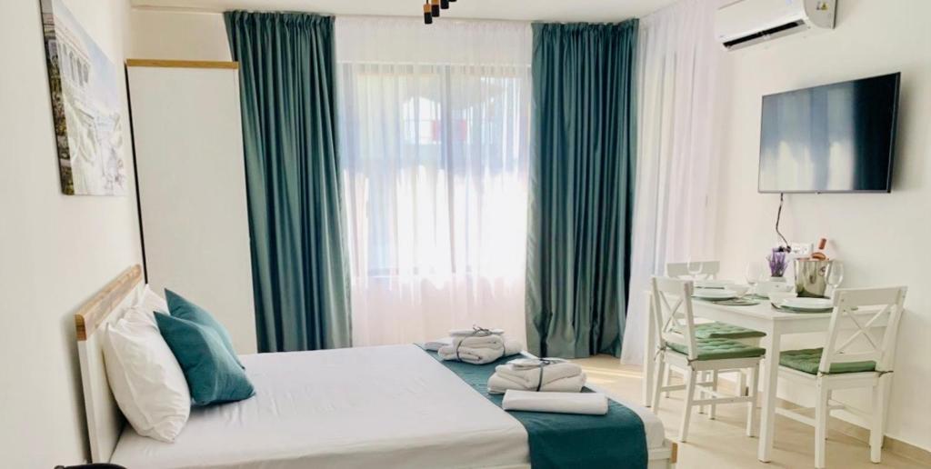 Ένα ή περισσότερα κρεβάτια σε δωμάτιο στο BAMBOO BEACH STUDIO- Sozopol