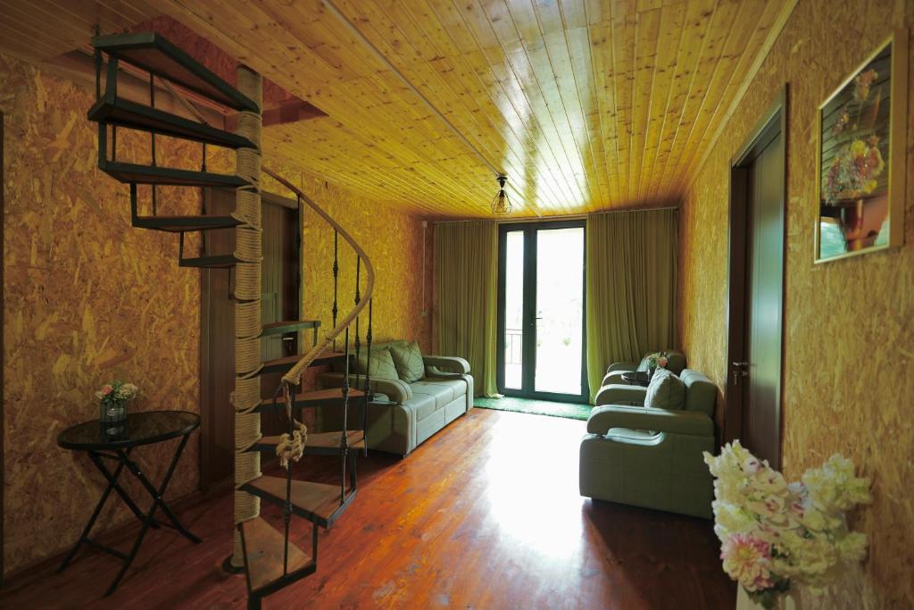 Posezení v ubytování Nahei Cottage Martvili
