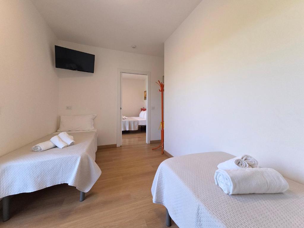 Posteľ alebo postele v izbe v ubytovaní Hotel Royal Garnì