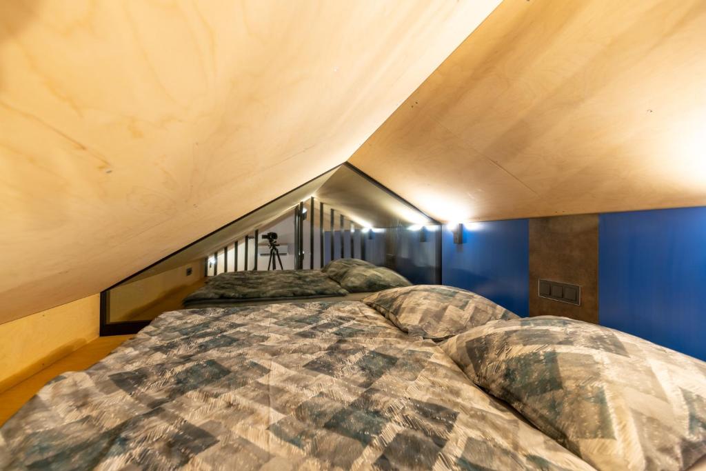 Postel nebo postele na pokoji v ubytování Tiny House - Tinyo Ostravinka