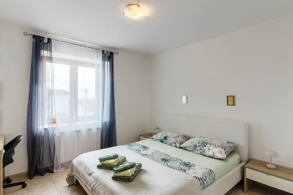 Postel nebo postele na pokoji v ubytování Villa Krasa sea view apartmants with pool