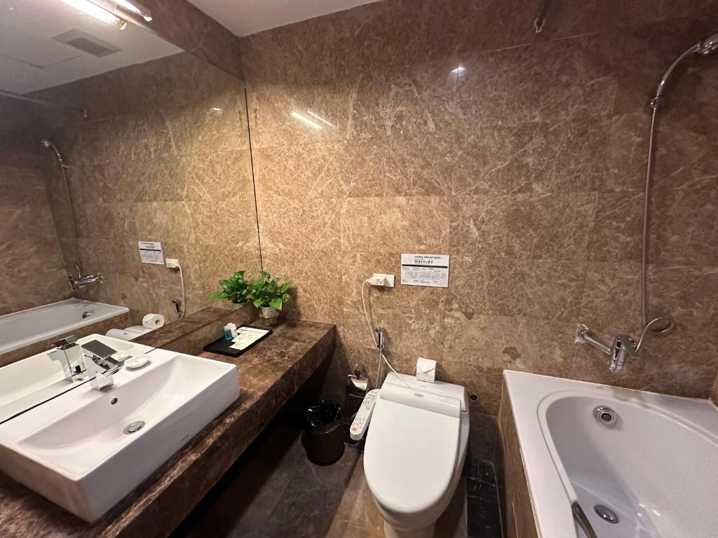 Koupelna v ubytování Nesta Hotel Hanoi