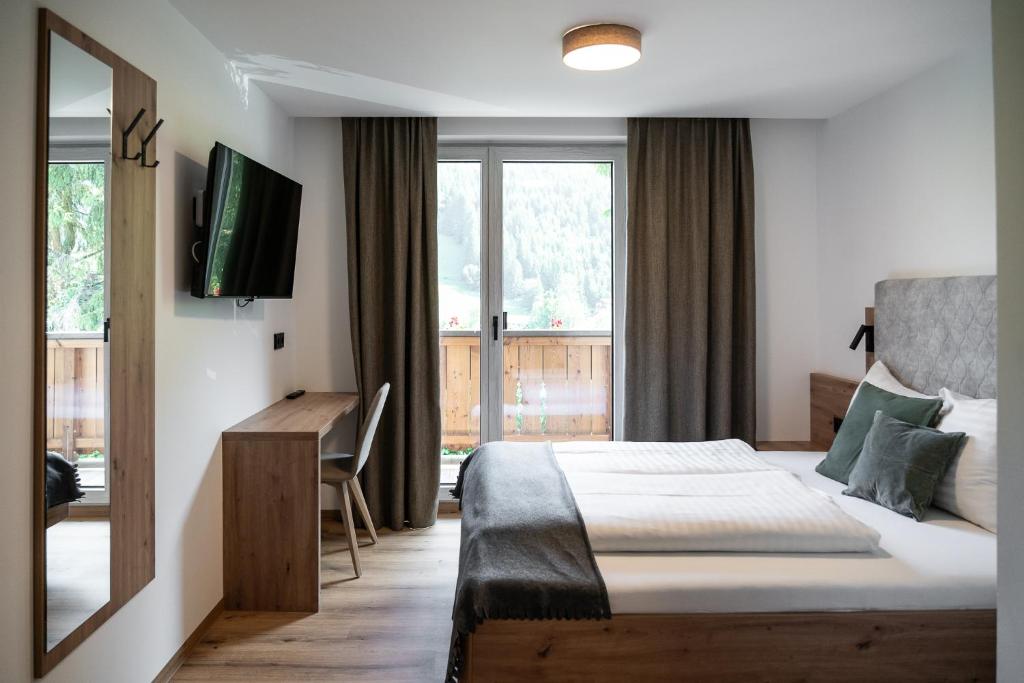 Postel nebo postele na pokoji v ubytování Gasthof Schöntal