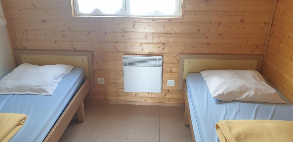 Postel nebo postele na pokoji v ubytování Onlycamp L'Orée des Vosges