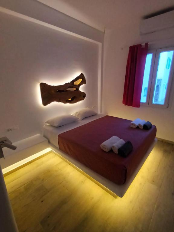 Postel nebo postele na pokoji v ubytování Alexandra Mykonos Port