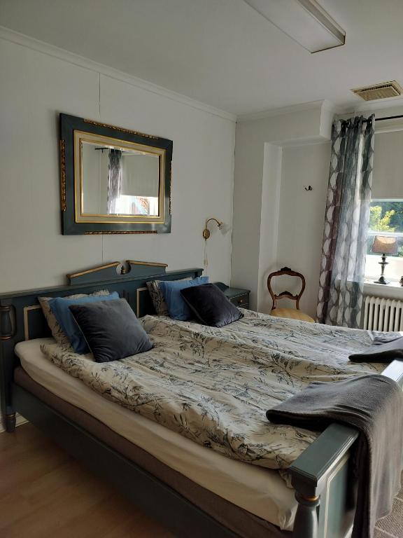 Postel nebo postele na pokoji v ubytování Pilane B&B