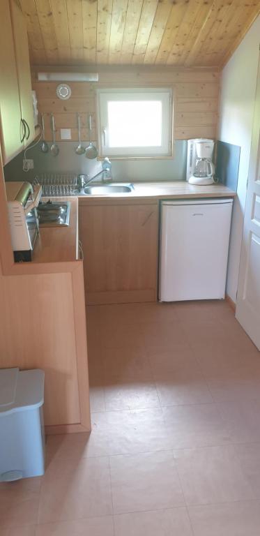 Kuchyň nebo kuchyňský kout v ubytování Onlycamp L'Orée des Vosges