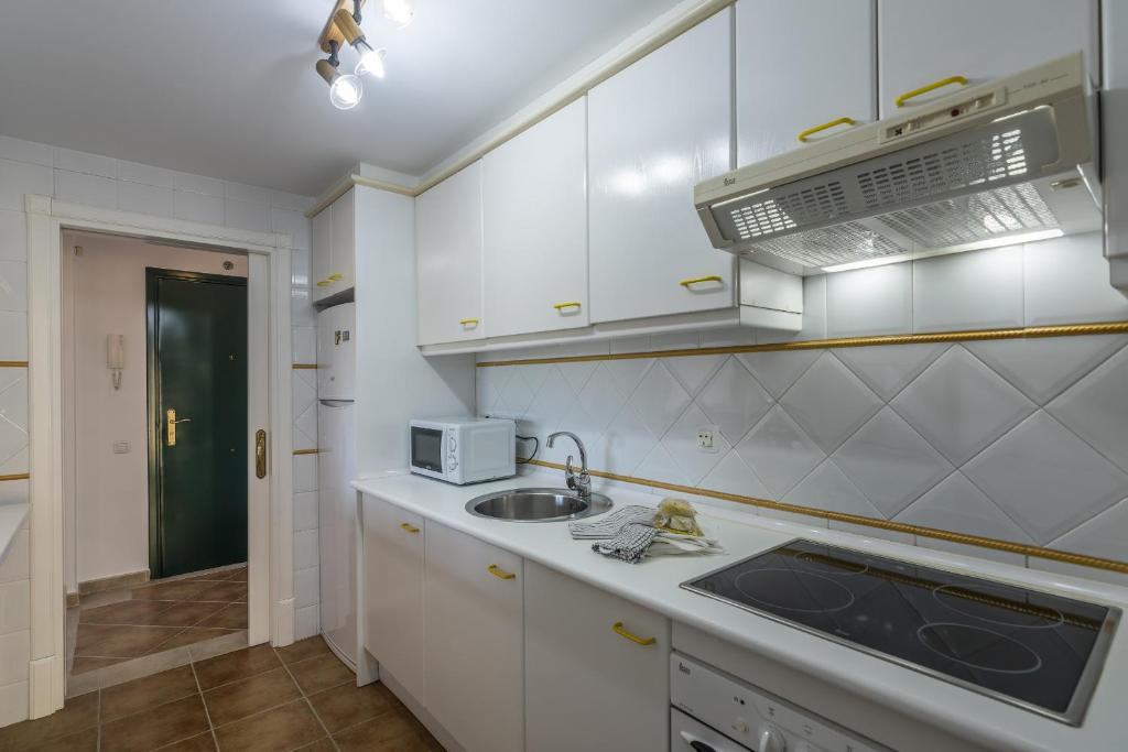 Kuchyň nebo kuchyňský kout v ubytování La Quinta I by Ĥ