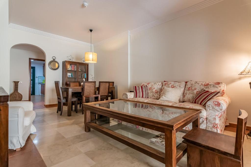 A seating area at El Rincon del Golf II by Ĥ - Isla Canela Golf GRHII18P21