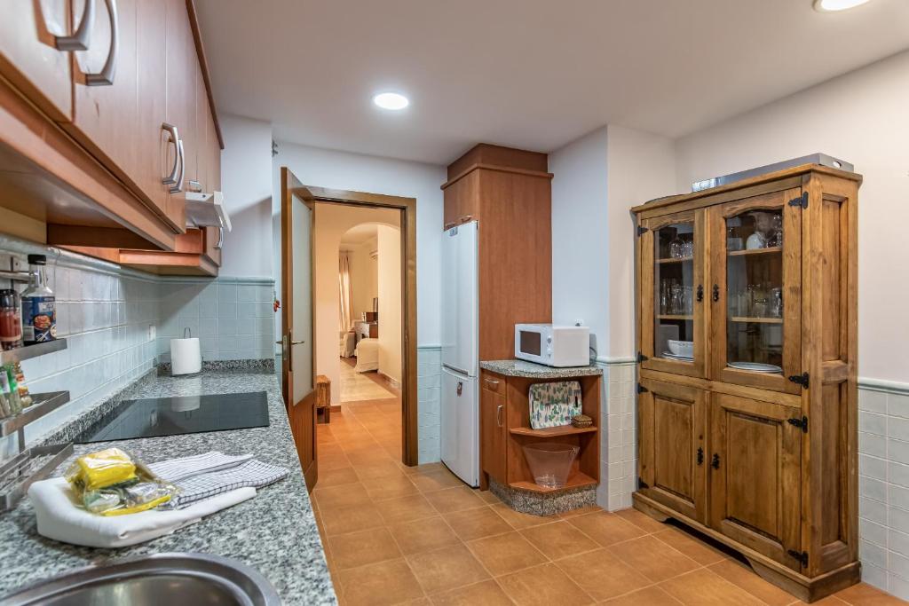 A kitchen or kitchenette at El Rincon del Golf II by Ĥ - Isla Canela Golf GRHII18P21