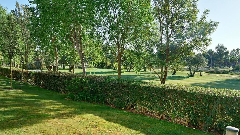 A garden outside El Rincon del Golf II by Ĥ - Isla Canela Golf GRHII18P21