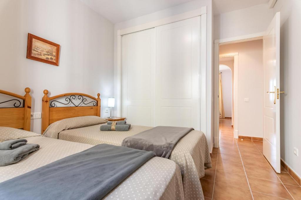 Posteľ alebo postele v izbe v ubytovaní Marina II by Ĥ