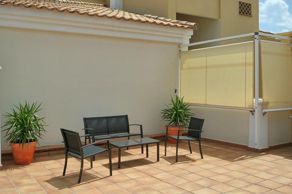 Patio alebo iná vonkajšia časť ubytovania Las Dunas by Ĥ
