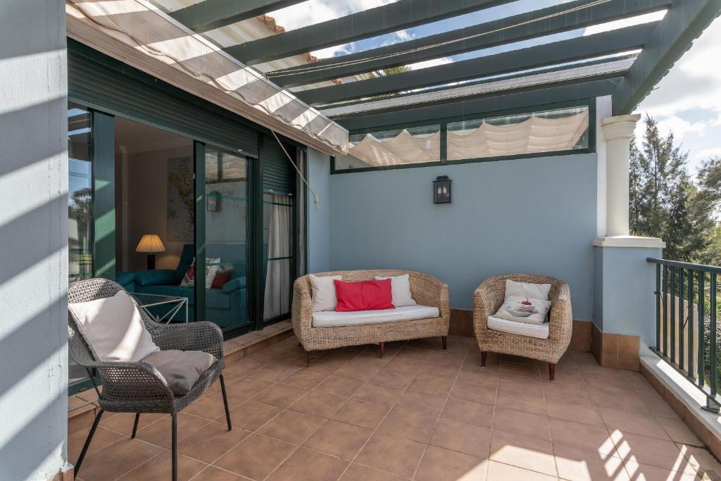 A balcony or terrace at El Rincon del Golf II by Ĥ - Isla Canela Golf GRHII18P21