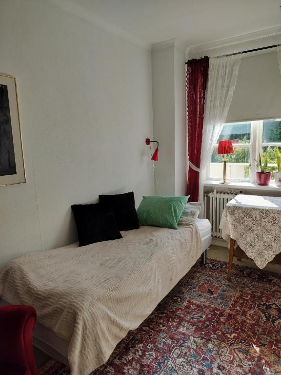 Postel nebo postele na pokoji v ubytování Pilane B&B