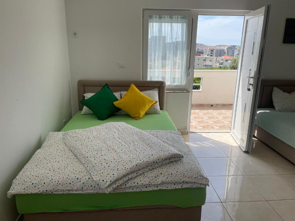 Postel nebo postele na pokoji v ubytování MIT-Apartments