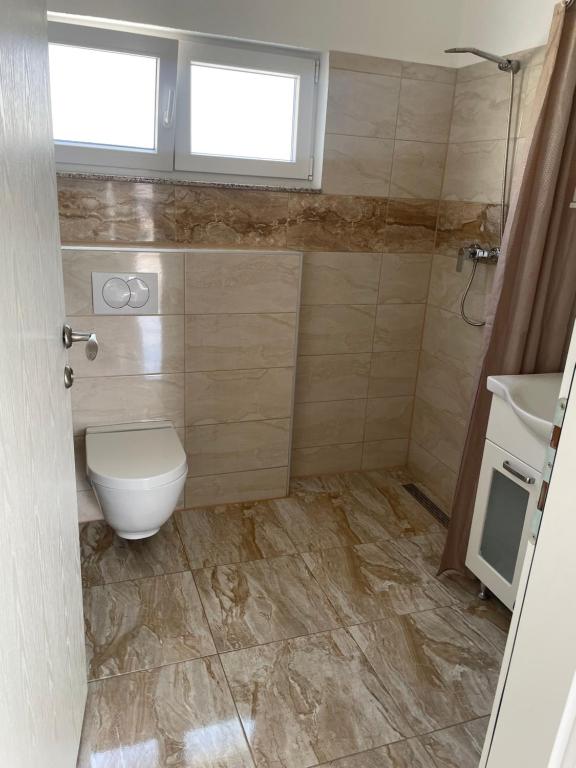 Koupelna v ubytování MIT-Apartments