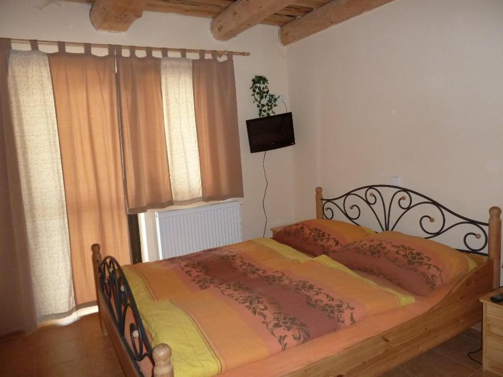 Postel nebo postele na pokoji v ubytování Q Ranch