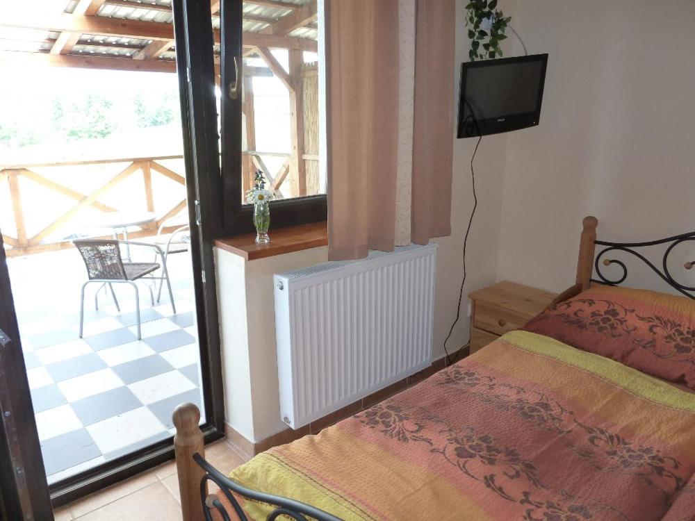 Postel nebo postele na pokoji v ubytování Q Ranch