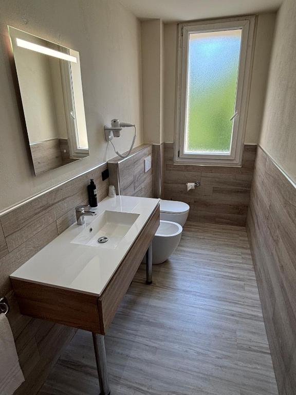 Koupelna v ubytování Hotel Fiera Wellness & Spa
