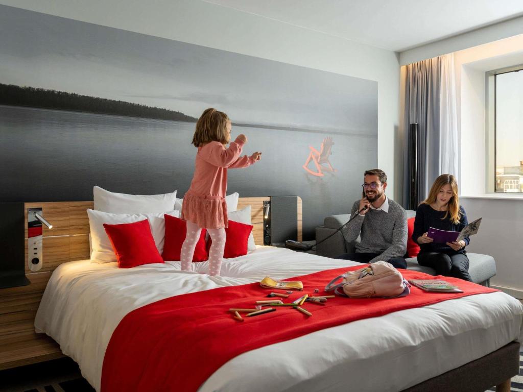 Cama ou camas em um quarto em Novotel Bucharest City Centre