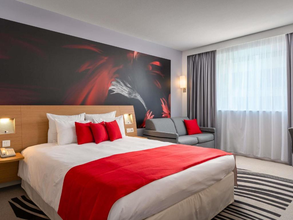 Cama ou camas em um quarto em Novotel Bucharest City Centre