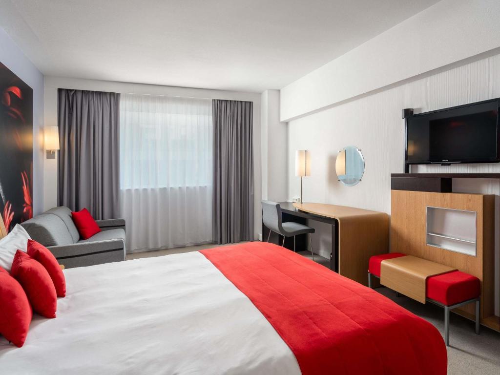 Cama ou camas em um quarto em Novotel Bucharest City Centre