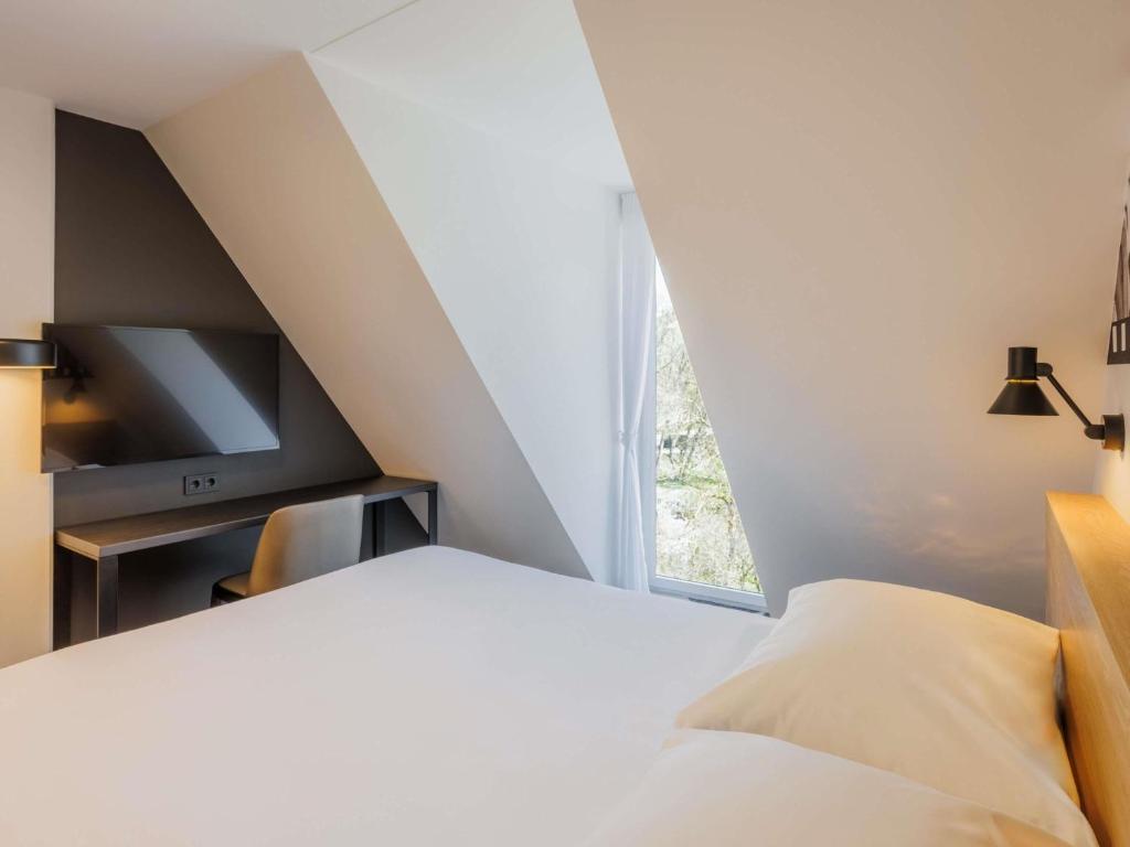 Voodi või voodid majutusasutuse Ibis Styles Tallinn toas