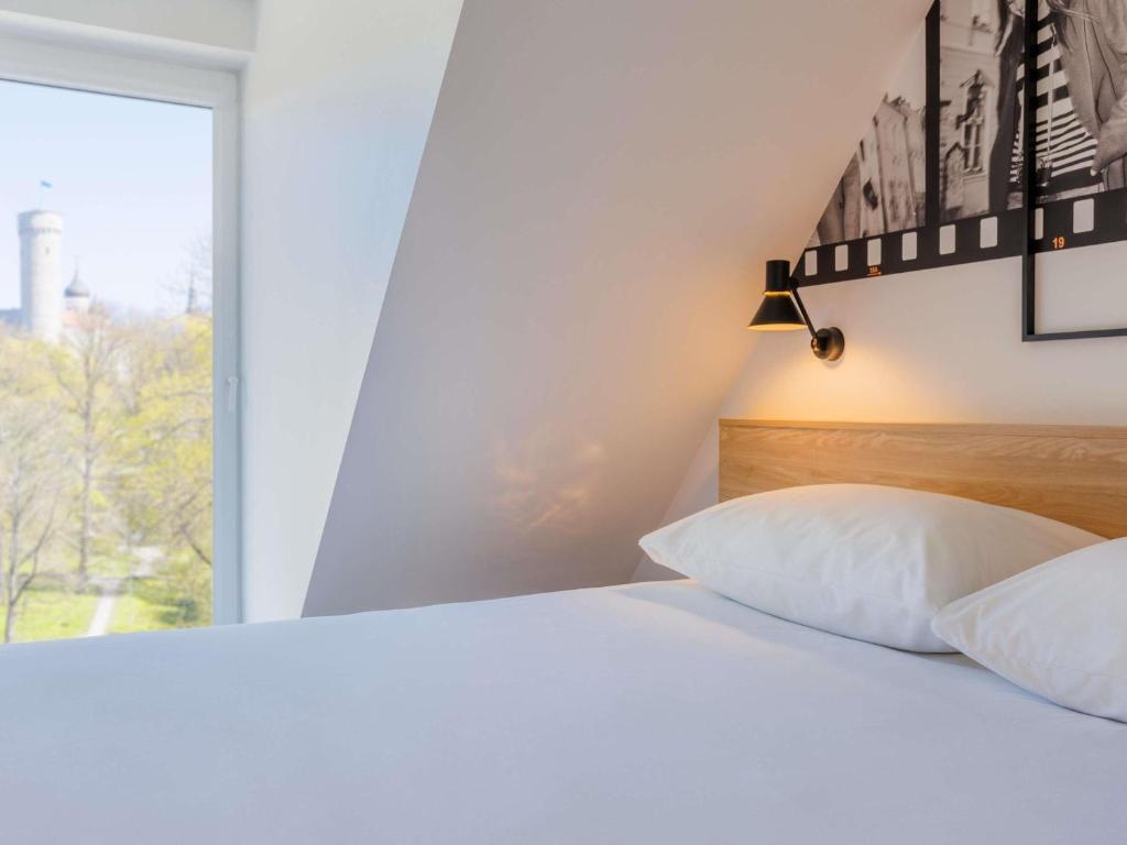 Voodi või voodid majutusasutuse Ibis Styles Tallinn toas