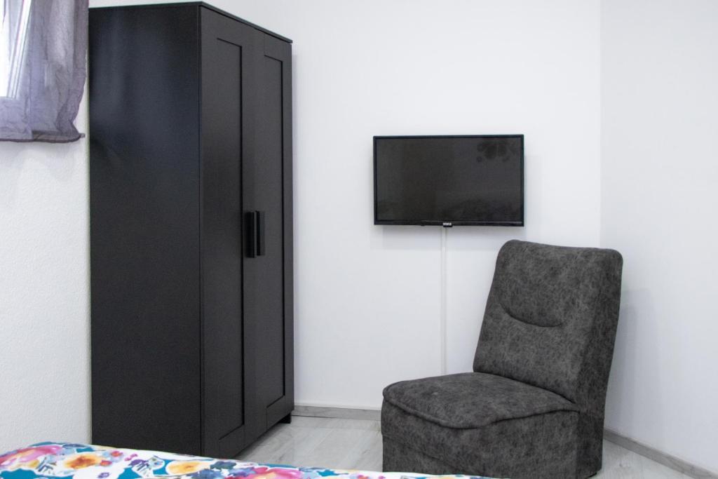 TV a/nebo společenská místnost v ubytování Sweet Dreams Apartment