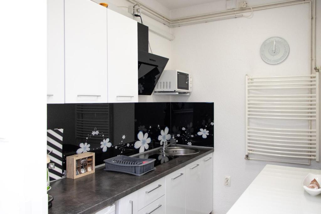 Kuchyň nebo kuchyňský kout v ubytování Sweet Dreams Apartment