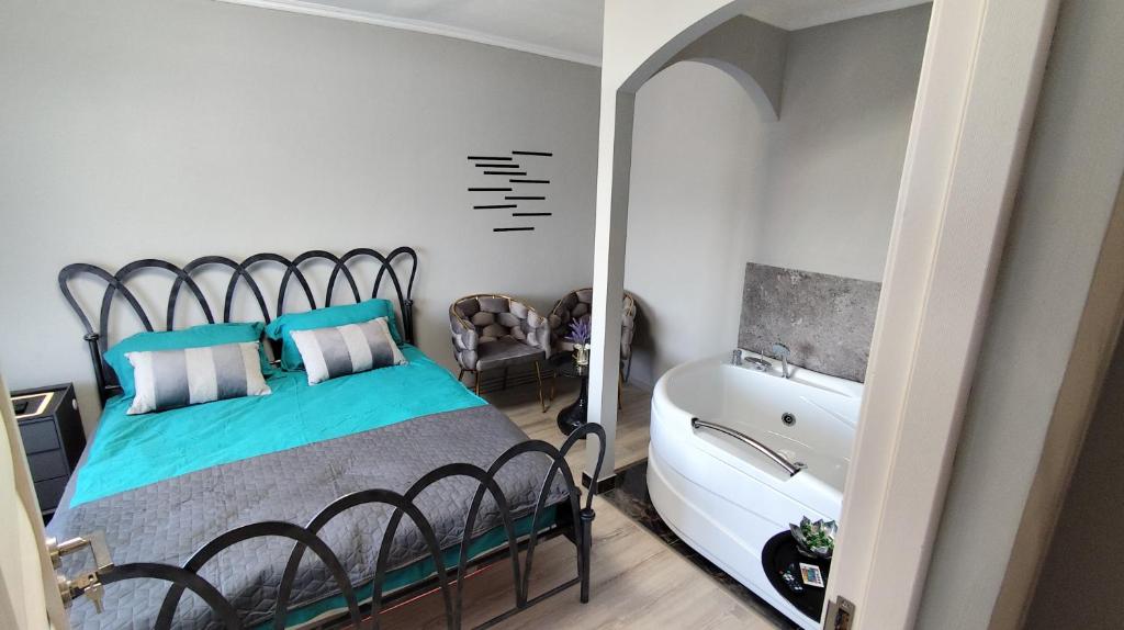 Ένα ή περισσότερα κρεβάτια σε δωμάτιο στο Darlar Loft
