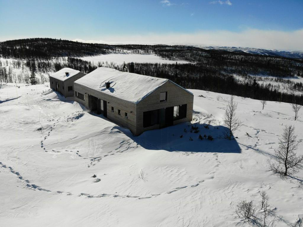 an aerial view of a house in the snow at Cabin Overlooking Hallingskarvet National Park in Geilo
