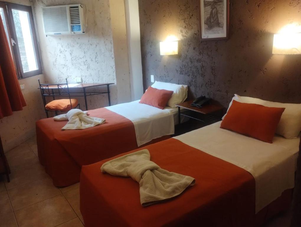 Una cama o camas en una habitación de Hotel Samka