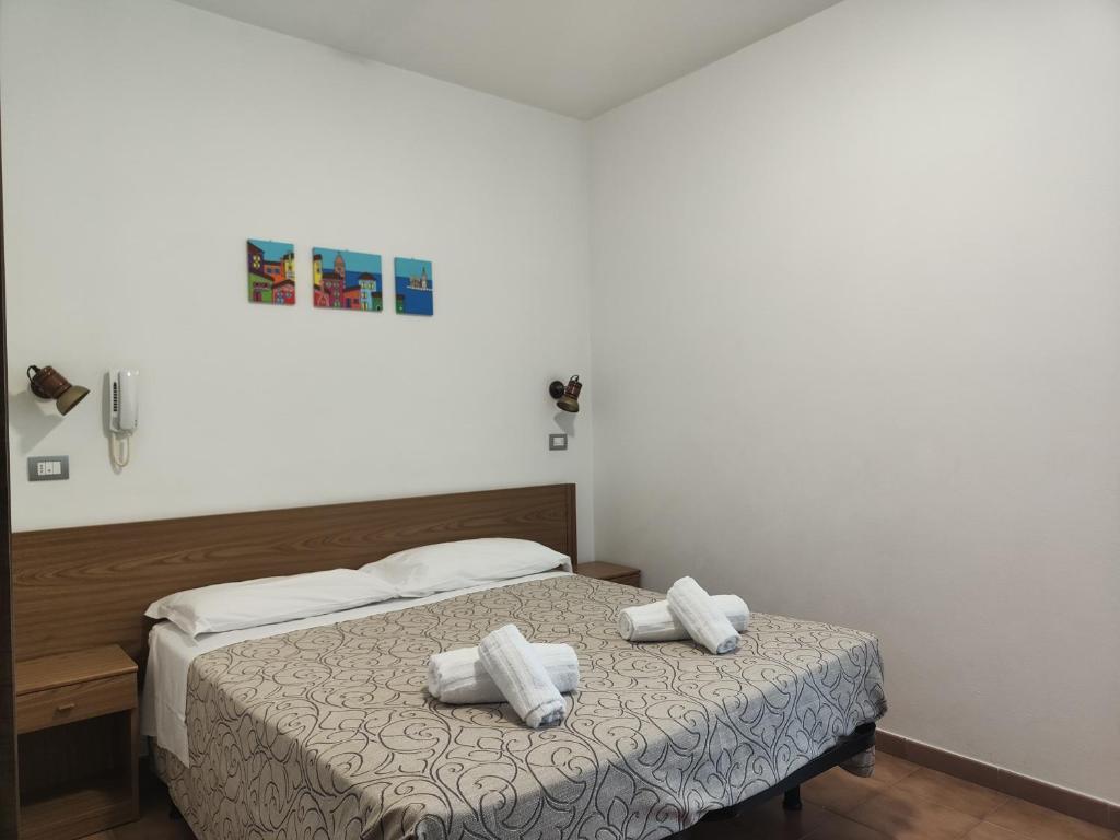 Postel nebo postele na pokoji v ubytování Hotel Anna