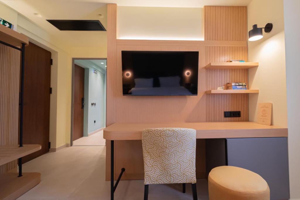 TV a/nebo společenská místnost v ubytování Sokratis Hotel