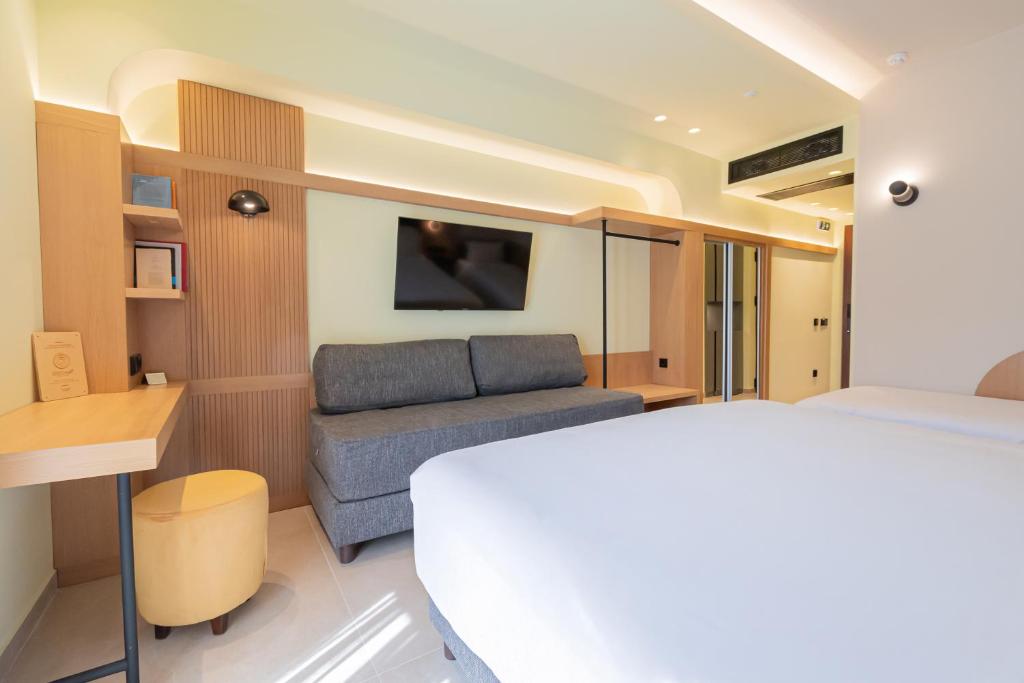 TV a/nebo společenská místnost v ubytování Sokratis Hotel